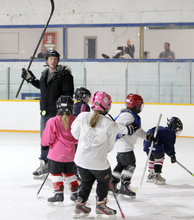Coaches Tom Duerksen and Nevin Mains (not pictured) wrangle the girls and boys of the U7 team during their practice last Thursday evening.