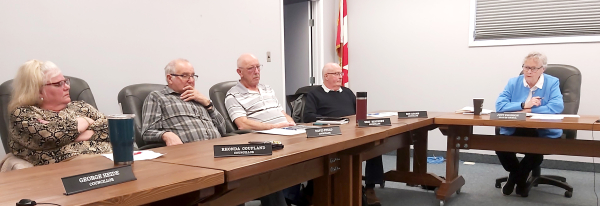 (L-R): Councillors Rhonda Coupland, David Stead, Eric Reichert and Rob Adams, along with Head of Council Judy Swanson, discuss the ins and outs of serving on Boissevain-Morton Council on April 9. A public meeting was held to give information to prospective candidates prior to the fall election.	