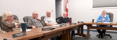 (L-R): Councillors Rhonda Coupland, David Stead, Eric Reichert and Rob Adams, along with Head of Council Judy Swanson, discuss the ins and outs of serving on Boissevain-Morton Council on April 9. A public meeting was held to give information to prospective candidates prior to the fall election.	