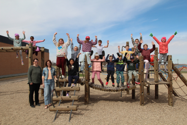 Heather Janssens (left) and Susan Jackson of the Boissevain Playground Committee celebrate with grade three students at the school after the announcement their project won the Growing Home with BASF prize. This comes with a $25,000 grant, which will be used to replace the aging middle school playground. Jackson said they received a total of 14,235 votes across the country in the win.