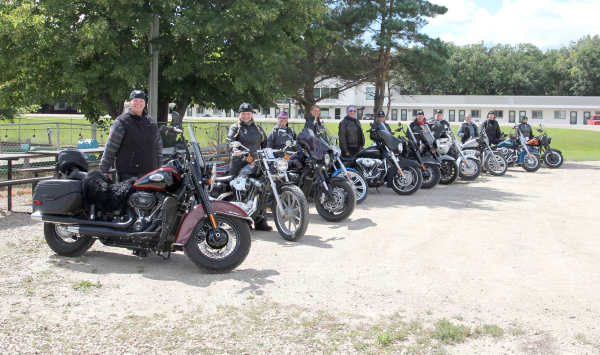 Eleven riders, all women, took to the highway for a cruise on August 23 for fellowship and fundraising.  (L-R): Stacy Downey (Melita), Rhonda Dickson (Melita), Amanda Cleaver (Minnedosa), Pamela Henry (Brandon), Courtney Carr (Virden), Stacey Wessing (Melita), Tammy Turner (Brandon), Amanda Renwick (Melita), Katharina Knipping (Brandon), Alana Bell Agnew (Melita), and Colleen Gibson (Virden). 