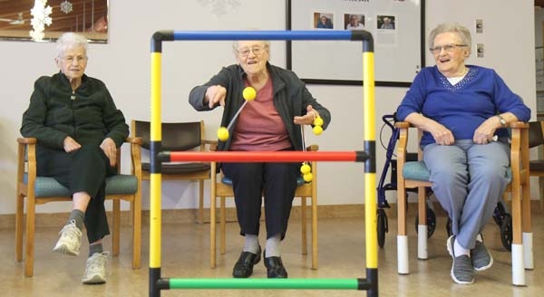 There is plenty to do during the cold snap at Westview Lodge. Marge Jacques (left), Phyllis McCorquodale and Mary Tipliski enjoy a little competition over a game of ladder ball on Tuesday, January 29. 