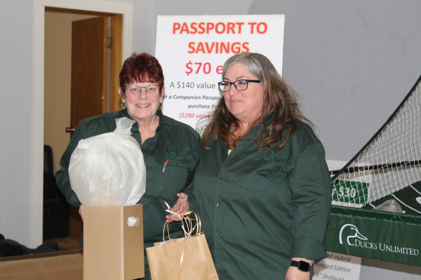 Heather Voth (left) dedicated 30 years to the Melita Ducks Unlimited group, helping organize the annual fundraisers. Fellow committee member Deb Green presented Heather with a gift of appreciation at the 2023 fundraiser on February 24 at the Melita Legion Hall.