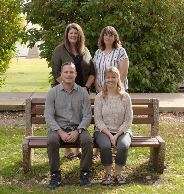 New Minto Principal Jamie Schultz (front, left) is starting his first year at the school, joining teacher Lisa Bos (front, right), teacher Kim Penner (back left) and EA Karen Fraser (back right). All are looking forward to a good year at Minto School.
