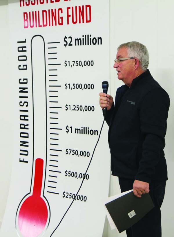 Assisted living committee chair George Heide speaks on the need for donations for the planned assisted living complex in Boissevain. A meeting was held on Wednesday, November 14 to give information and solicit donations from the public. As the thermometer shows, they are close to $700,000, and are looking to collect $2 million.       