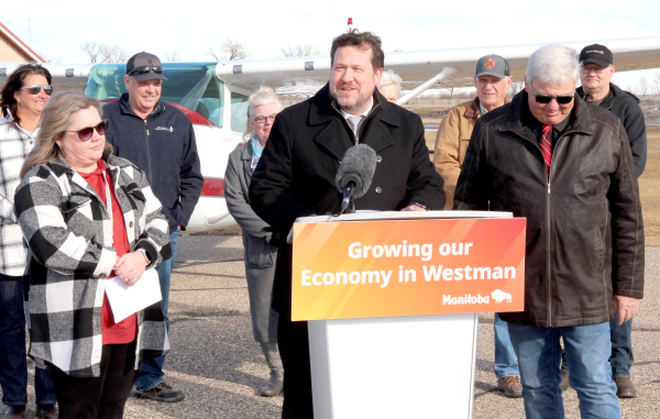 Municipal and Northern Affairs Minister Glen Simard made a big funding announcement at the Deloraine-Winchester Airport on February 12. The province committed $1.49 million to help with repaving the airstrip and adding lighting. It has also been upgraded to regional status. The airport is well used, for medical flights, crop dusting, training and other purposes. It is not only Deloraine-Winchester, but the entire area that gains value from the airstrip. Deloraine-Winchester Reeve Kelly McMechan said they were pleased with the help from the province, are planning a community meeting next month, and will continue their own fundraising for the project. See story inside.