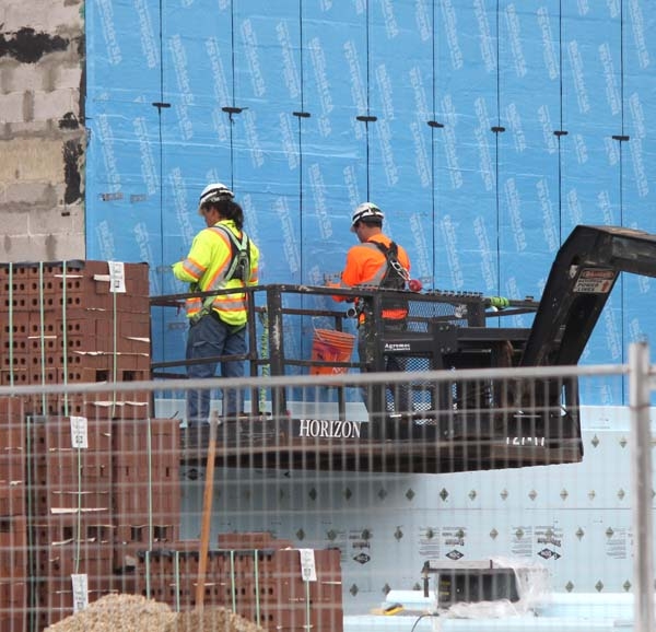 Staff with Horizon Builders work on the walls of the Boissevain School. Classes resume on Wednesday, September 5, and a large portion of the school is closed off due to construction and repairs, causing classrooms to be temporarily relocated throughout the school. 