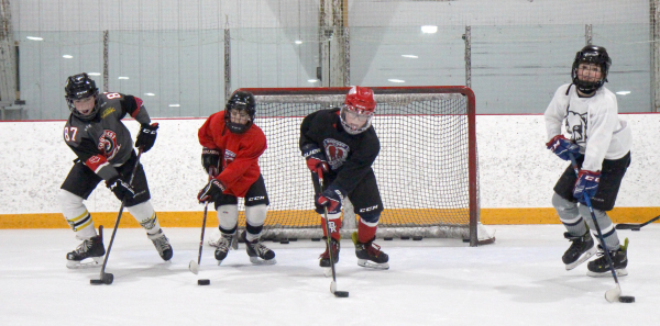 The Boissevain U11 team members (from left) AJ Latimer, Huntley Dales, Lucas Jasper and Winston Kempthorne run drills to prepare for upcoming provincials, to be held in Boissevain March 4-6.  Deloraine will also be hosting provincials Rural Female U11 from February 25-27. Melita will be the site for the U15 A Female Provincials from February 26-27. Killarney will host the U13 Rural B Provincials from March 11-13. See story page 13.  