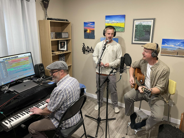 There is exciting news in the local music scene. Robert Critchley (left) has opened a music-recording studio in his home near Lake Metigoshe. His son, Elijah Critchley (middle) and Nathan Nasby enjoy jamming in the studio with Robert.